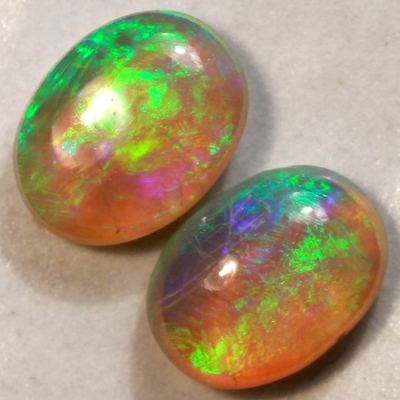 SOLID CRYSTAL OPALS Matching pair, 3D pattern. Bright green fire sparkles